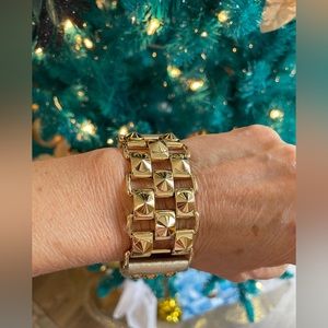 Gold leather band with gold grommets